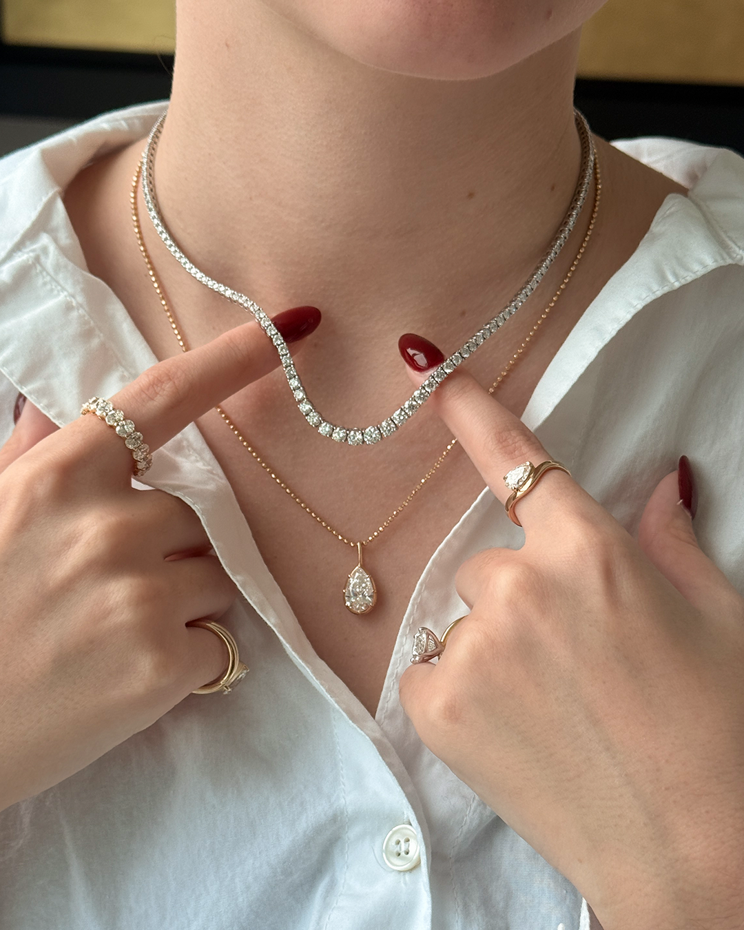 Diamond rivière necklace and fine jewelry styled with a white shirt